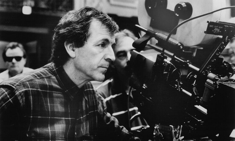 Ο πατέρας του ήταν κομμουνιστής και γι’ αυτό δεν μπόρεσε να μπει σε Ελληνικό πανεπιστήμιο ή να πάει στην Αμερική, αλλά κέρδισε 2 Όσκαρ